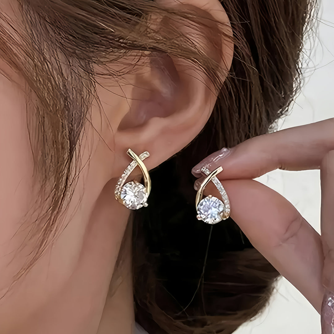Stud earrings with cross and zirconia