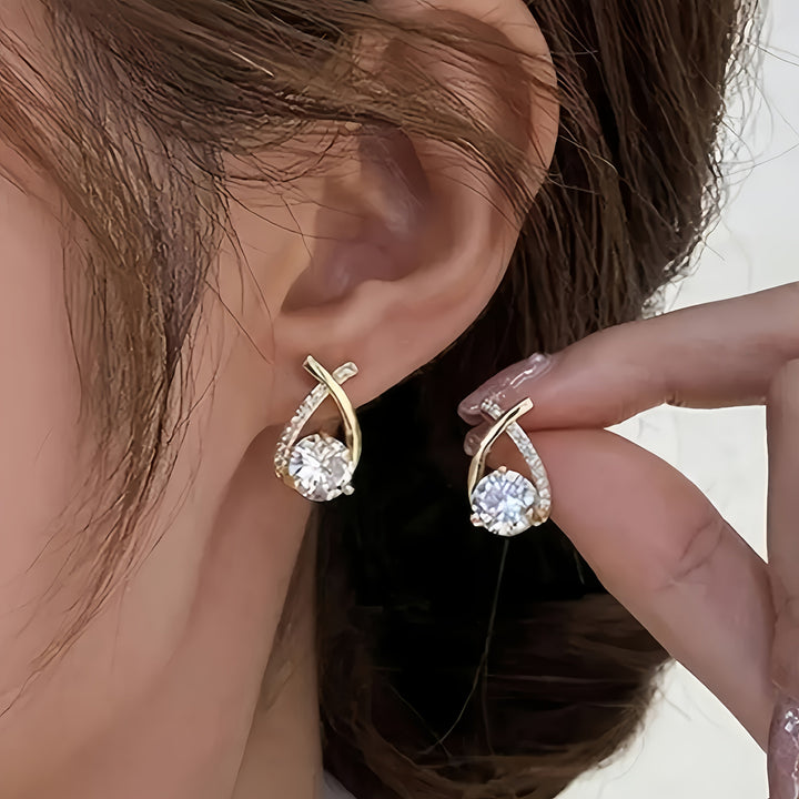 Stud earrings with cross and zirconia