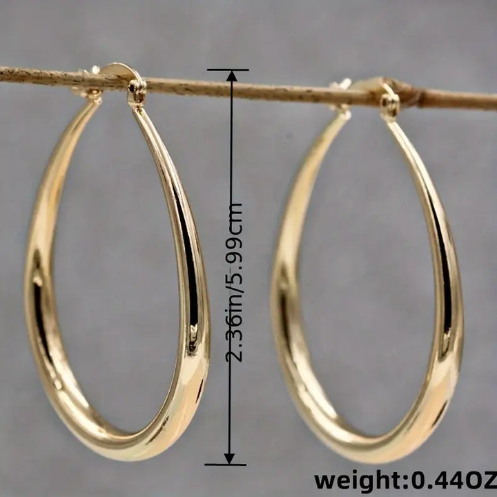 Stylish gold hoop earrings with a smooth finish