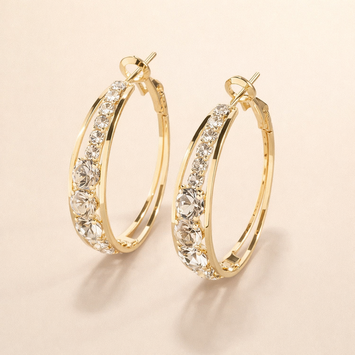 Soft gold earrings with delicate decoration