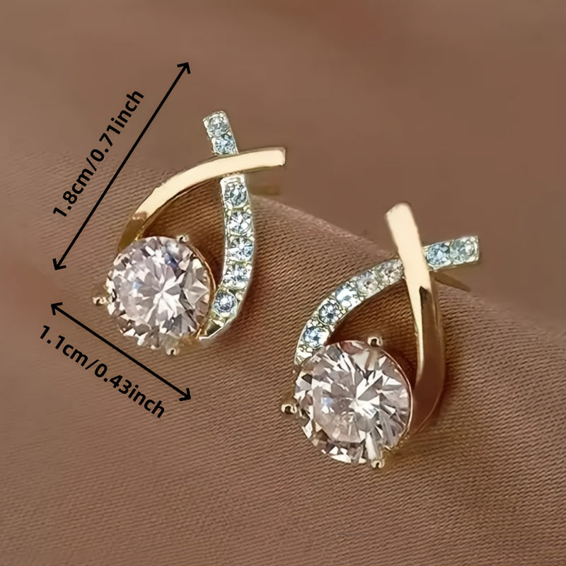 Earrings with golden cross and zirconia