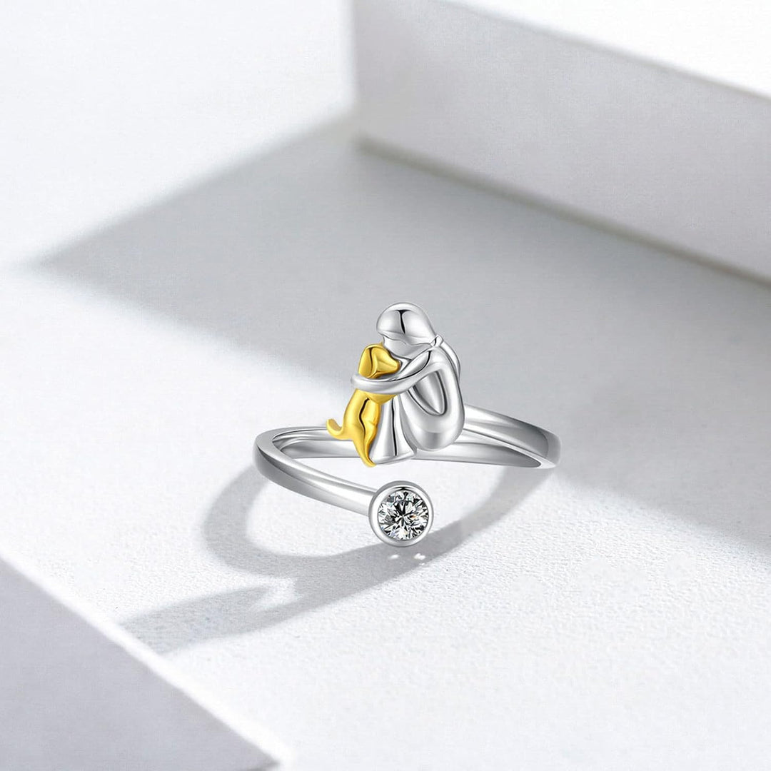 Silver ring with puppy and zirconia stones.