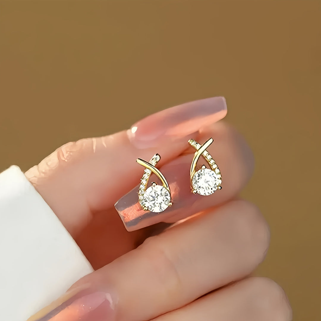 Stud earrings with cross and zirconia