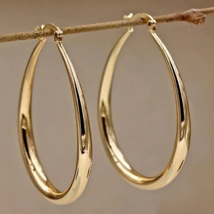 Stylish gold hoop earrings with a smooth finish
