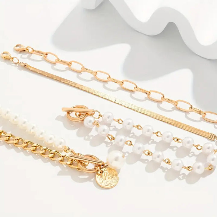 Chic bracelet set (4 pieces) – snake, pearls and links