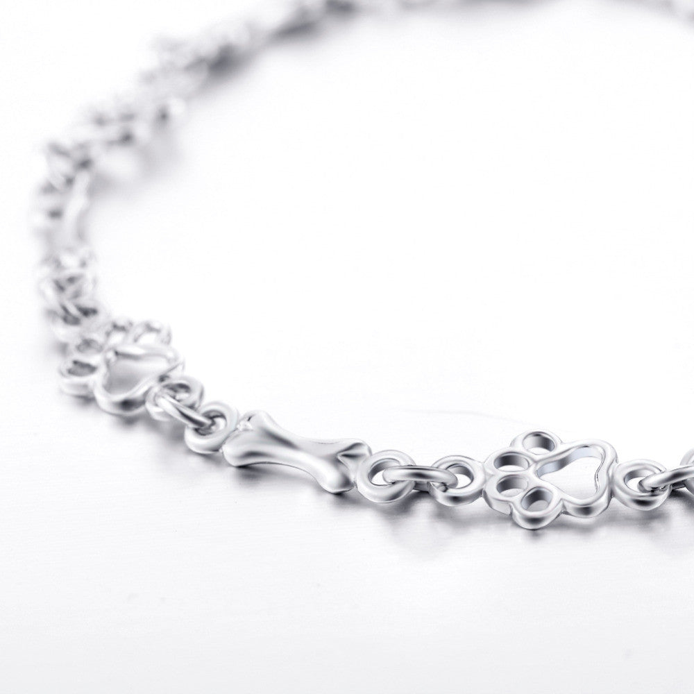 Silver Bracelet with Dog Paw and Bone Charm