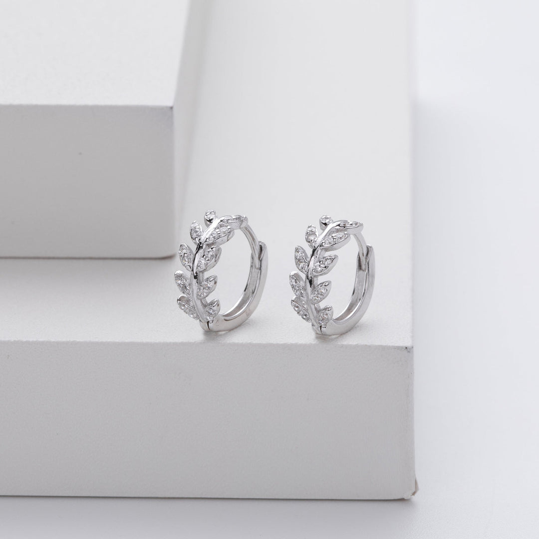 Silver earrings in the shape of a leaf