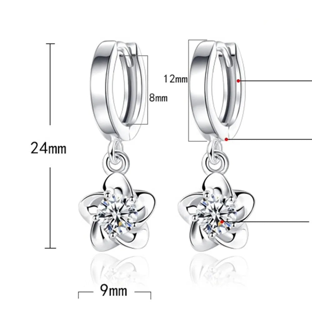 Silver earrings with purple and white zirconia