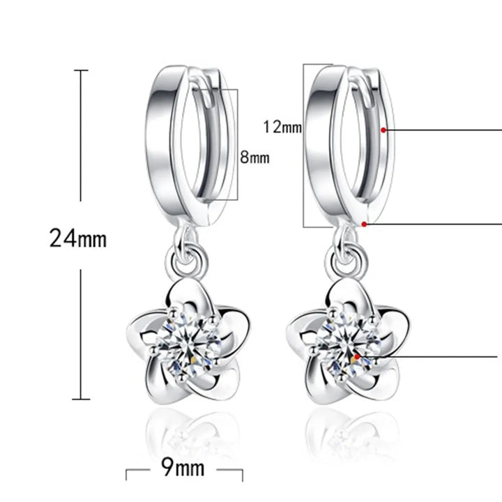Silver earrings with purple and white zirconia
