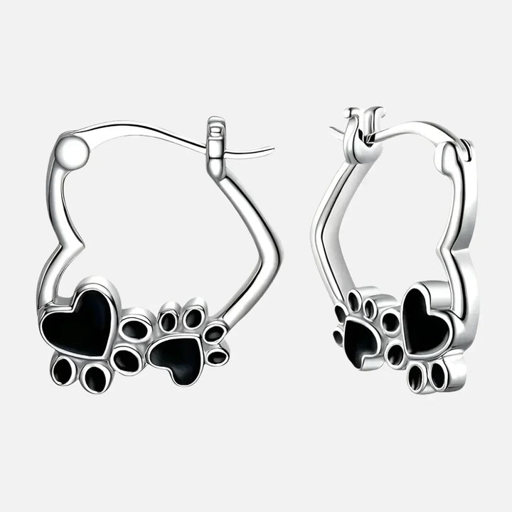 Huggie earrings with hearts and black enamel.