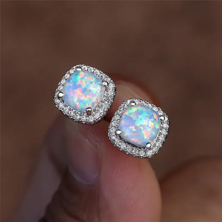 Elegant Earrings with Round White Fire Opal
