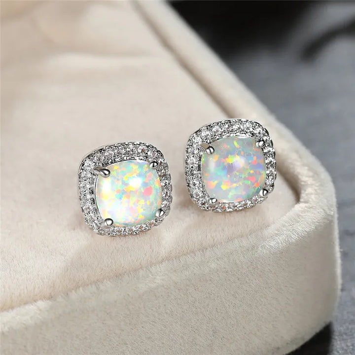 Elegant Earrings with Round White Fire Opal