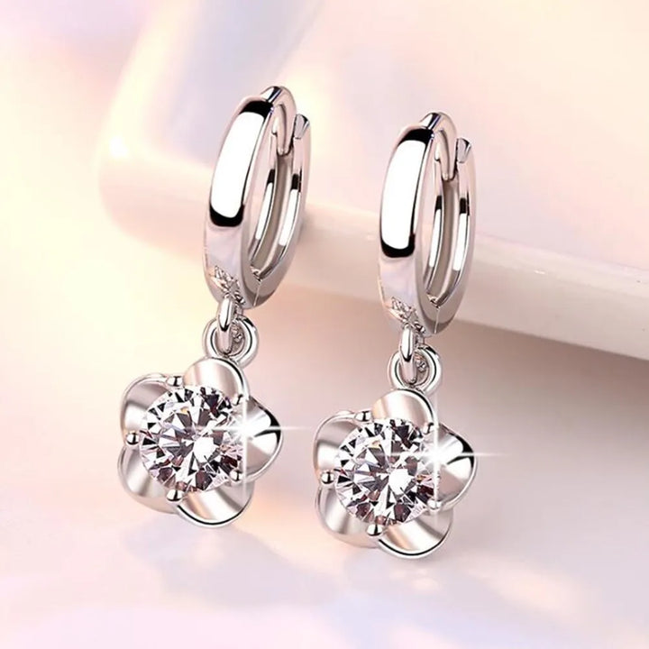 Silver earrings with purple and white zirconia