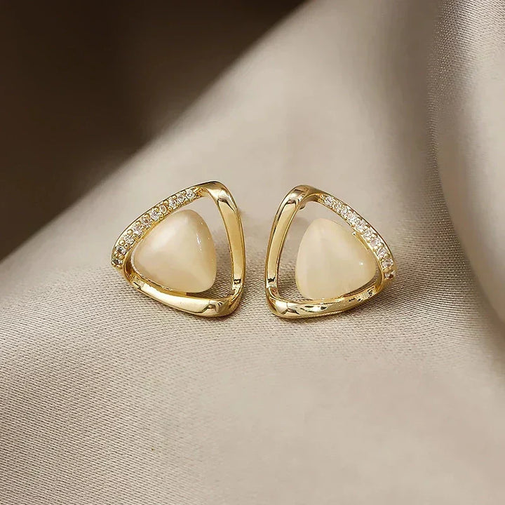 Elegant triangular earrings with opal and crystals