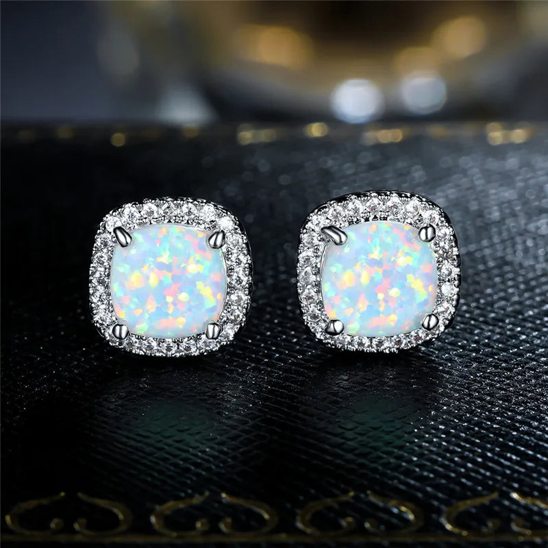 Elegant Earrings with Round White Fire Opal