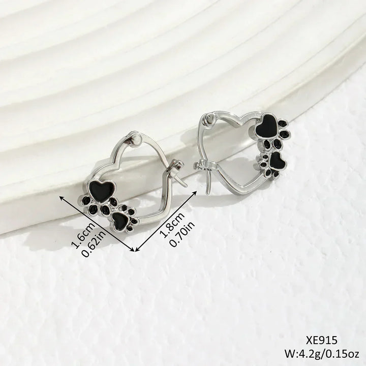 Huggie earrings with hearts and black enamel.