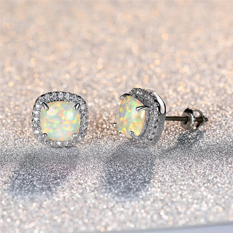 Elegant Earrings with Round White Fire Opal