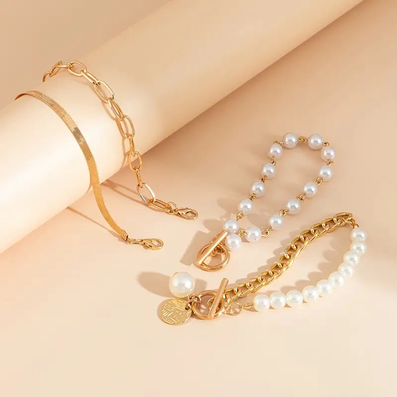 Chic bracelet set (4 pieces) – snake, pearls and links