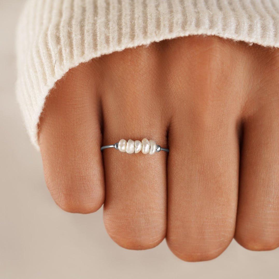 Silver ring with classic pearls