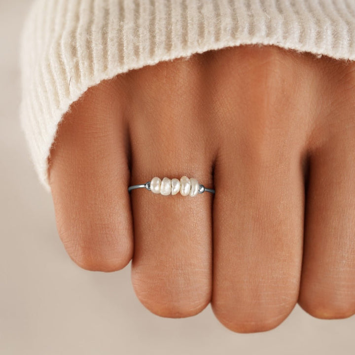 Silver ring with classic pearls
