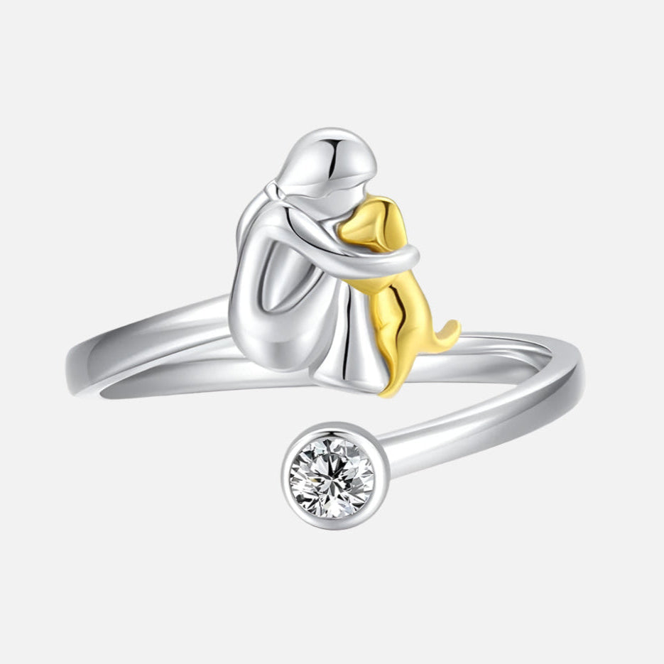 Silver ring with puppy and zirconia stones.